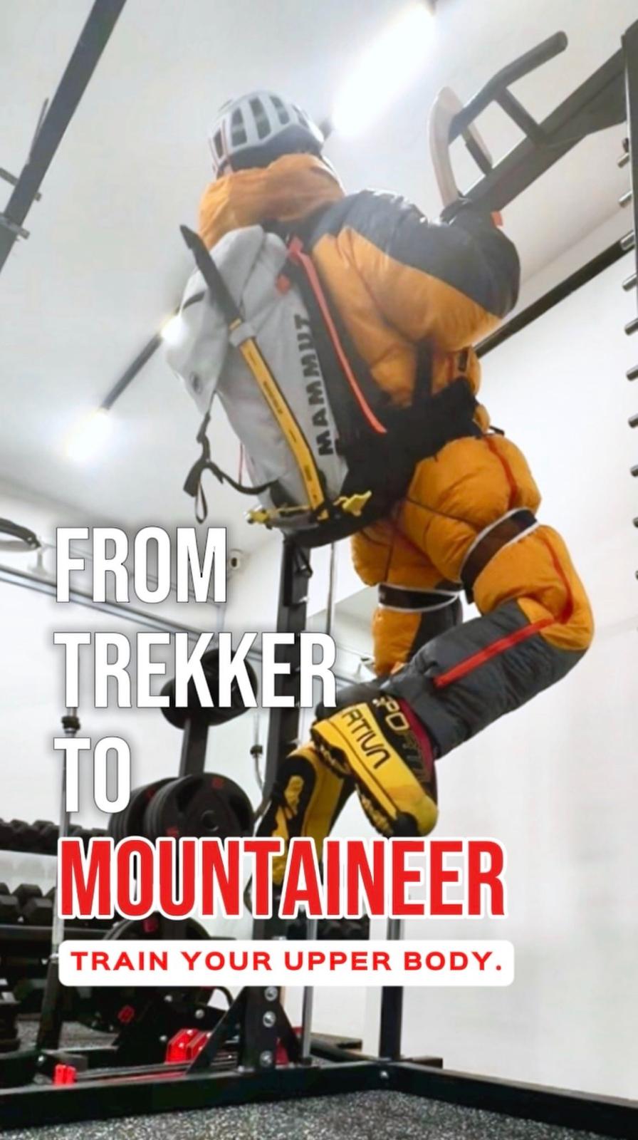 Mountaineer in an orange suit training their upper body in a gym