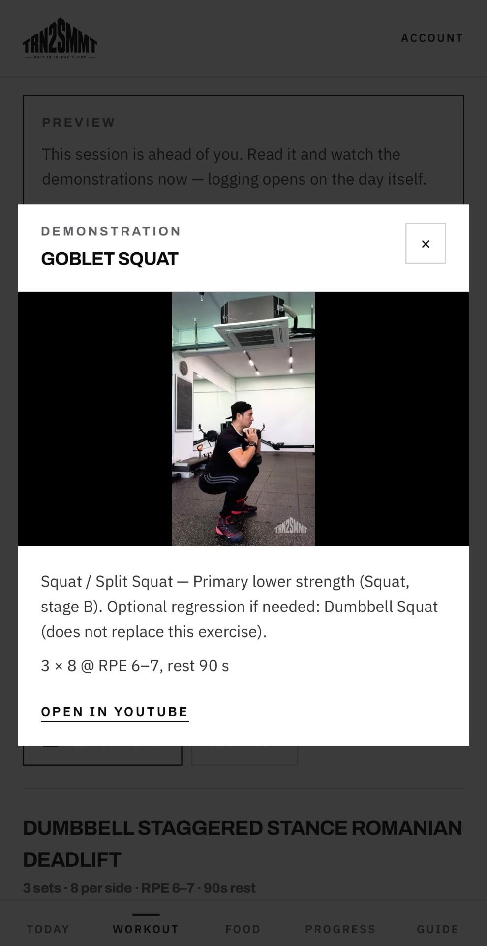 TRN2SMMT exercise guidance screen showing a goblet squat demonstration